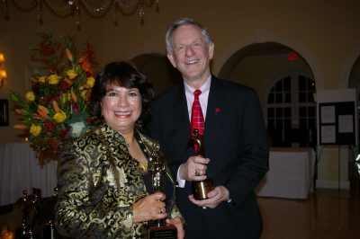 Image of Niki and Dennis McCuistion holding Telly awards
